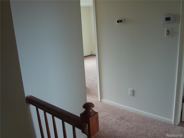 38014 Mallast St, Harrison Township, MI 48045 - corridor featuring carpet floors, an upstairs landing, and a baseboard heating unit