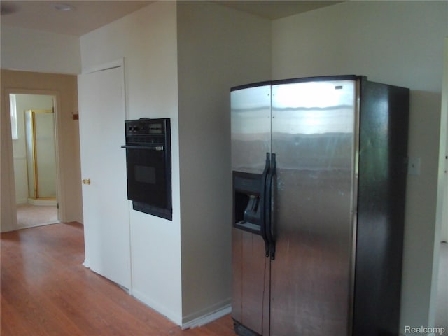 38014 Mallast St, Harrison Township, MI 48045 - kitchen featuring stainless steel fridge, oven, and wood finished floors