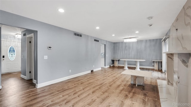 6596 Corral Ct, West Bloomfield, MI 48324 - below grade area with recessed lighting and light wood-type flooring