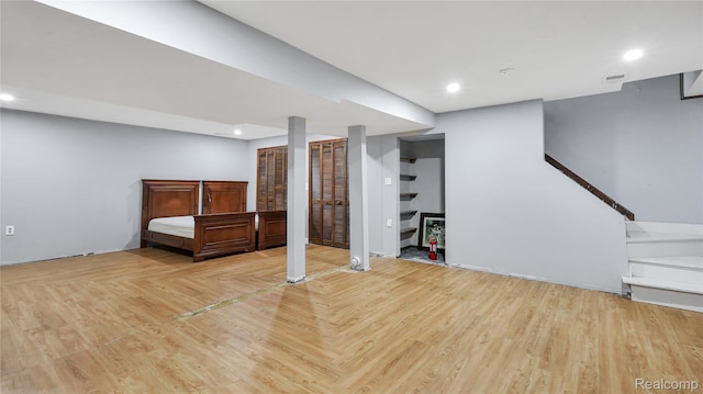 6596 Corral Ct, West Bloomfield, MI 48324 - finished below grade area with parquet floors and recessed lighting