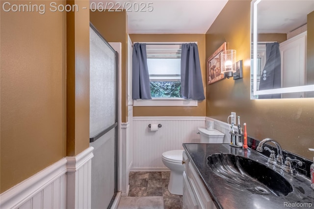 8780 Dixie Hwy, Birch Run, MI 48415 - full bathroom featuring wainscoting, a shower stall, and vanity