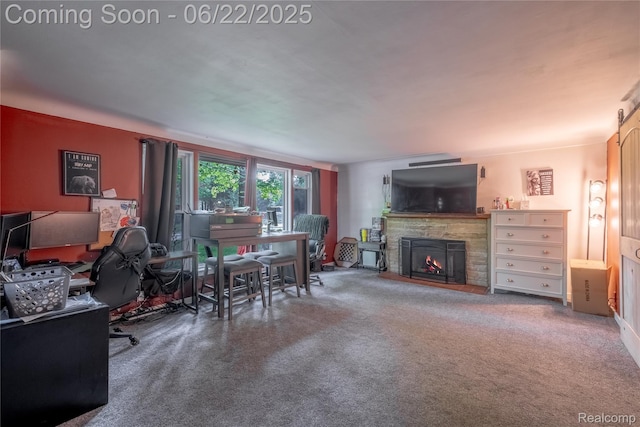 8780 Dixie Hwy, Birch Run, MI 48415 - carpeted living area featuring a stone fireplace and a desk