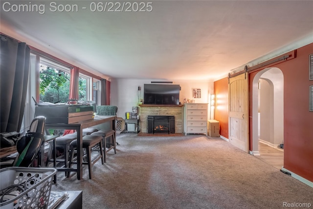 8780 Dixie Hwy, Birch Run, MI 48415 - carpeted living room with arched walkways and a stone fireplace