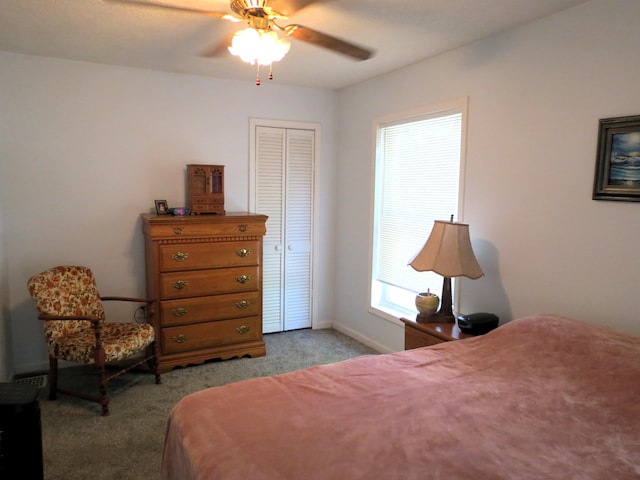 1513 Joy Ave, Jackson, MI 49203 - bedroom featuring light carpet, ceiling fan, and a closet