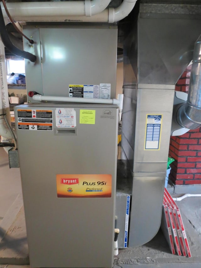 1513 Joy Ave, Jackson, MI 49203 - utility room featuring heating unit
