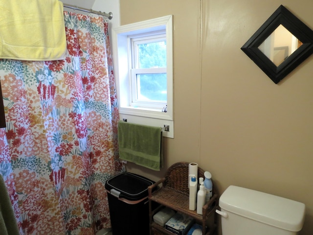 1513 Joy Ave, Jackson, MI 49203 - bathroom featuring toilet and curtained shower
