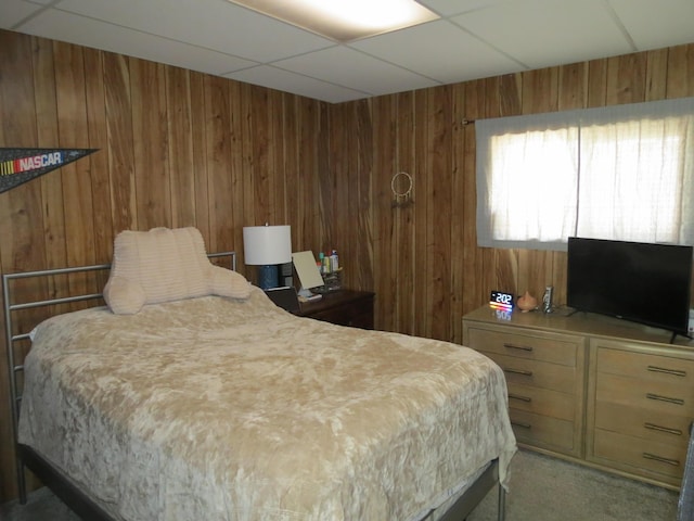 1513 Joy Ave, Jackson, MI 49203 - bedroom with wooden walls, a paneled ceiling, and carpet