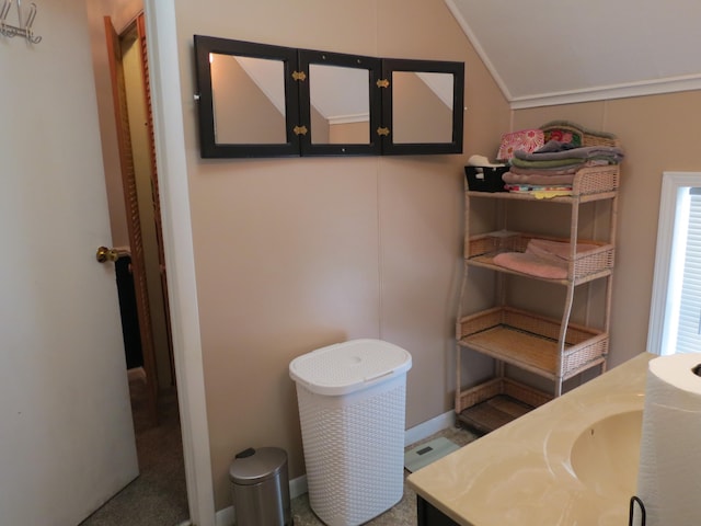 1513 Joy Ave, Jackson, MI 49203 - bathroom featuring vaulted ceiling and vanity