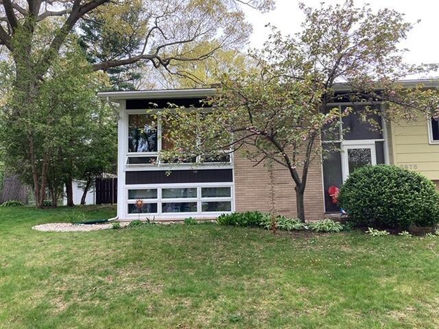 2975 Princeton Ct, Muskegon, MI 49441 - view of side of property featuring a yard