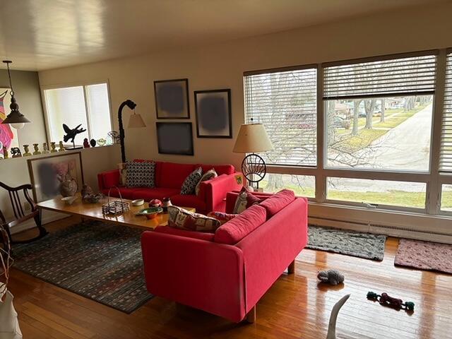 2975 Princeton Ct, Muskegon, MI 49441 - living room with healthy amount of natural light and wood finished floors