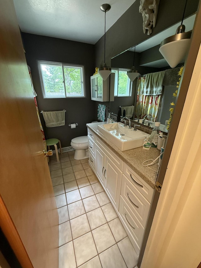 2975 Princeton Ct, Muskegon, MI 49441 - full bathroom featuring tile patterned flooring, vanity, and a shower with shower curtain