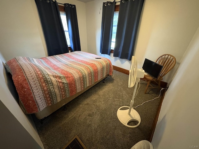 7408 Carleton Rd, Clayton, MI 49235 - bedroom with carpet floors and baseboards