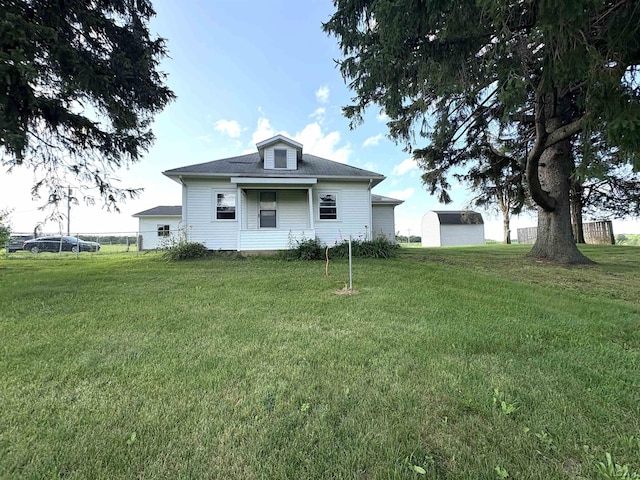 7408 Carleton Rd, Clayton, MI 49235 - view of front of home with a front lawn
