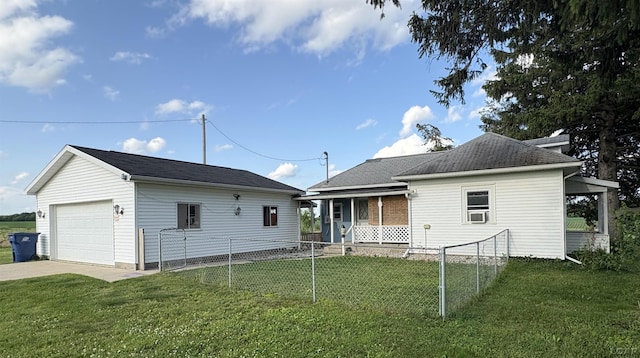 7408 Carleton Rd, Clayton, MI 49235 - back of property featuring covered porch, concrete driveway, a detached garage, an outbuilding, and cooling unit