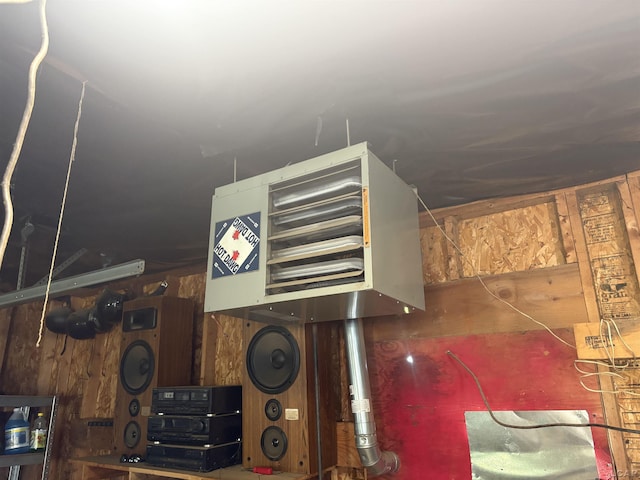 7408 Carleton Rd, Clayton, MI 49235 - detailed view of a heating unit and wood walls