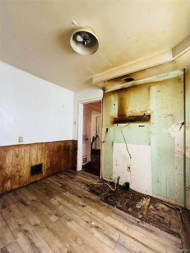 18241 Kentfield St, Detroit, MI 48219 - empty room with wood-type flooring and wainscoting