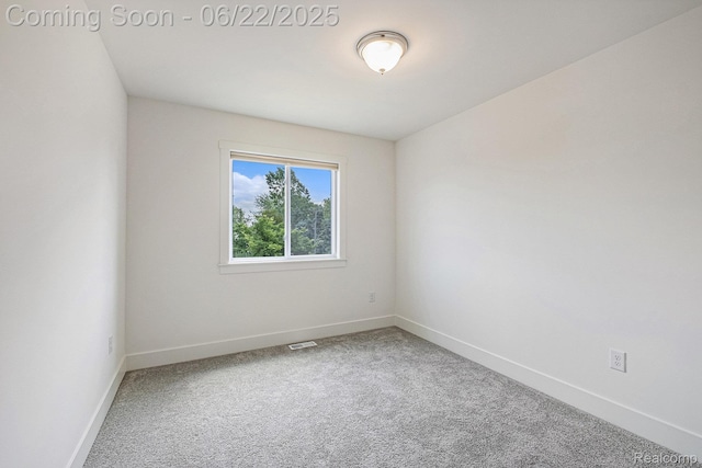 1013 Lancaster St, Lapeer, MI 48446 - carpeted spare room with baseboards