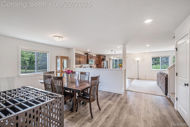 1013 Lancaster St, Lapeer, MI 48446 - dining room featuring light wood-type flooring and recessed lighting