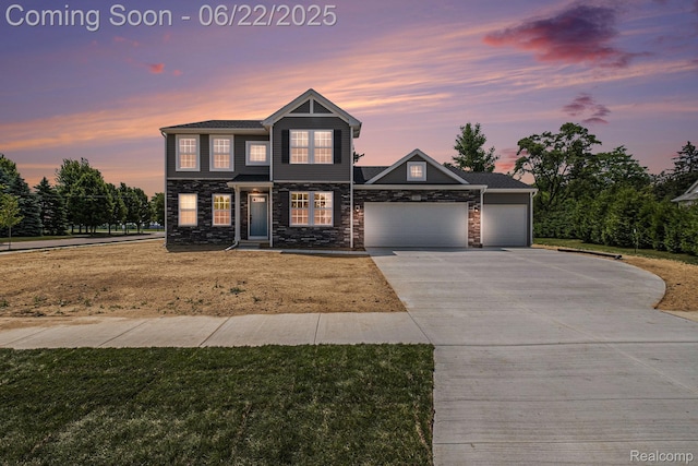 1013 Lancaster St, Lapeer, MI 48446 - view of front facade featuring driveway, an attached garage, a lawn, and stone siding