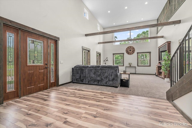 2539 Daisy Ln, Middleville, MI 49333 - living room featuring light wood-type flooring, a high ceiling, and recessed lighting