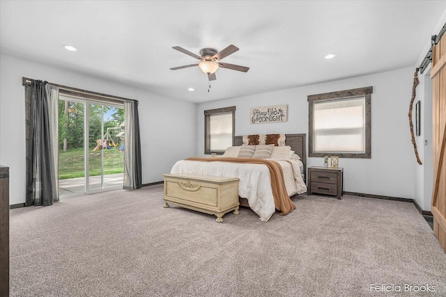 2539 Daisy Ln, Middleville, MI 49333 - bedroom featuring access to outside, light carpet, recessed lighting, a ceiling fan, and a barn door
