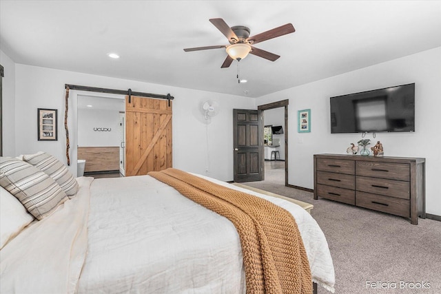 2539 Daisy Ln, Middleville, MI 49333 - bedroom with carpet, a barn door, a ceiling fan, recessed lighting, and connected bathroom