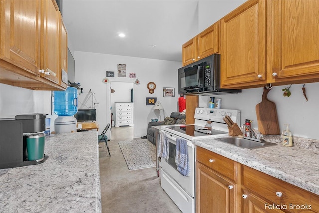 2539 Daisy Ln, Middleville, MI 49333 - kitchen featuring white electric range, black microwave, concrete floors, brown cabinetry, and light stone countertops