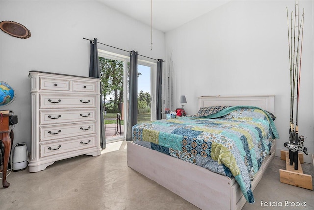 2539 Daisy Ln, Middleville, MI 49333 - bedroom with access to outside and finished concrete flooring