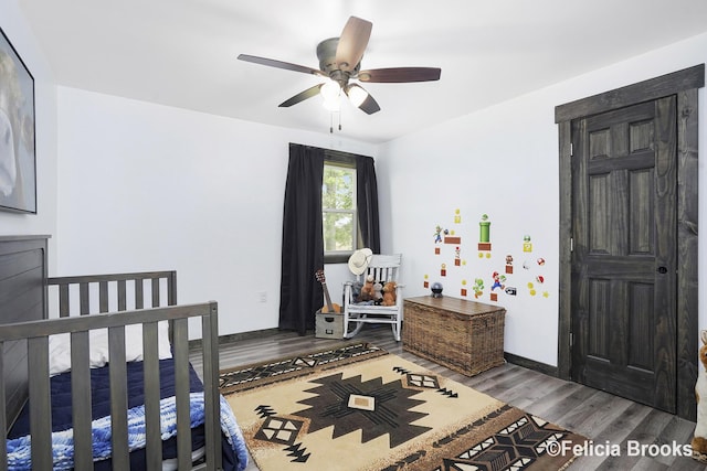 2539 Daisy Ln, Middleville, MI 49333 - bedroom featuring wood finished floors and a ceiling fan