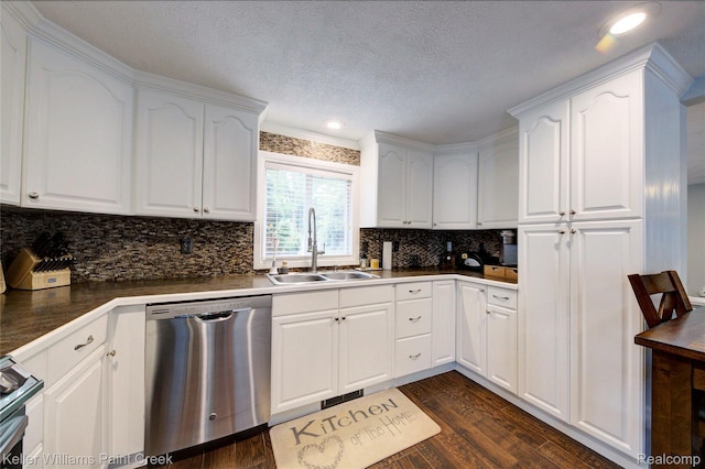 1320 W Drahner Rd, Oxford, MI 48371 - kitchen featuring stainless steel appliances, dark wood-type flooring, dark countertops, decorative backsplash, and white cabinets