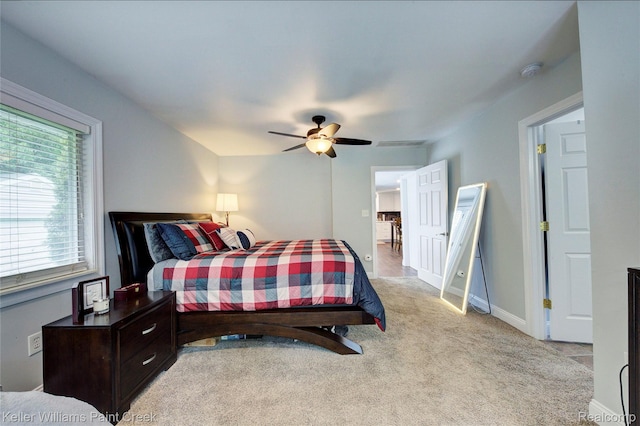 1320 W Drahner Rd, Oxford, MI 48371 - bedroom with light colored carpet and a ceiling fan