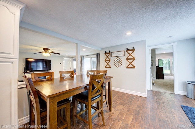 1320 W Drahner Rd, Oxford, MI 48371 - dining area featuring dark wood-style flooring, a textured ceiling, a ceiling fan, and recessed lighting