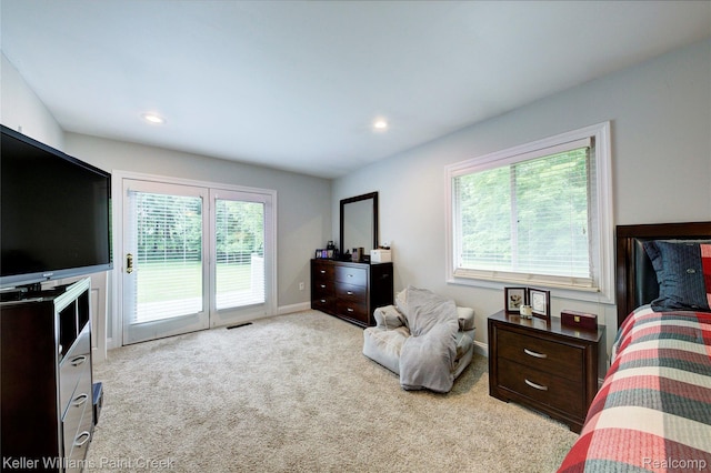 1320 W Drahner Rd, Oxford, MI 48371 - bedroom with access to exterior, light carpet, and recessed lighting