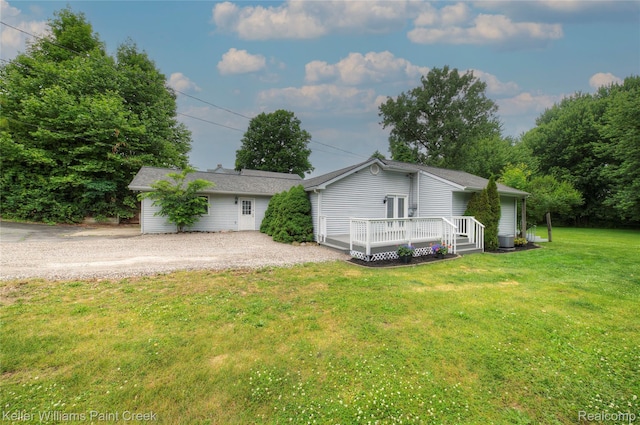 1320 W Drahner Rd, Oxford, MI 48371 - view of property exterior featuring driveway, a yard, and a deck