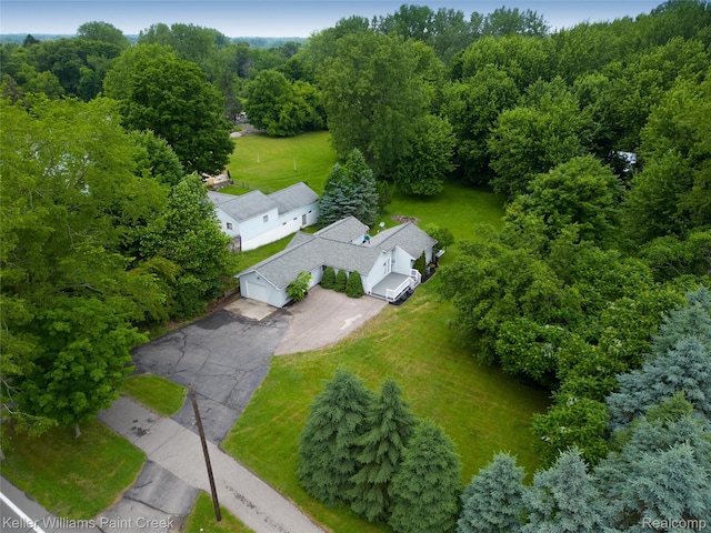 1320 W Drahner Rd, Oxford, MI 48371 - view from above of property with a heavily wooded area