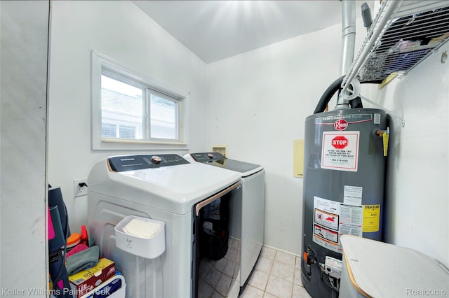 1320 W Drahner Rd, Oxford, MI 48371 - laundry room featuring gas water heater, separate washer and dryer, and light tile patterned floors