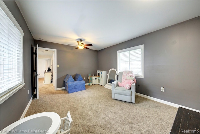 1320 W Drahner Rd, Oxford, MI 48371 - sitting room featuring ceiling fan and carpet