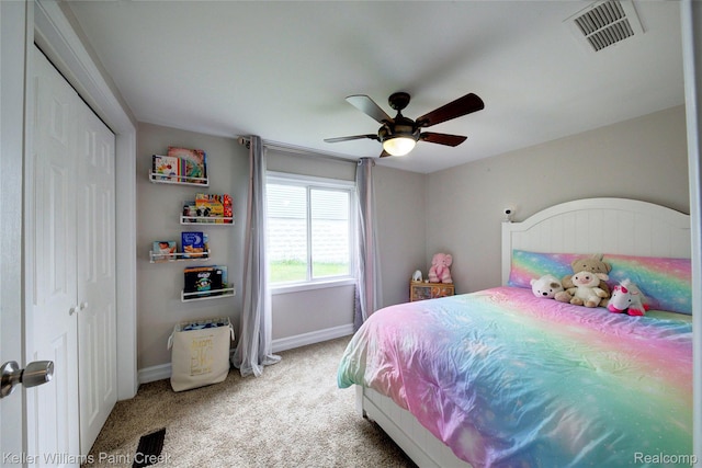 1320 W Drahner Rd, Oxford, MI 48371 - carpeted bedroom with ceiling fan and a closet