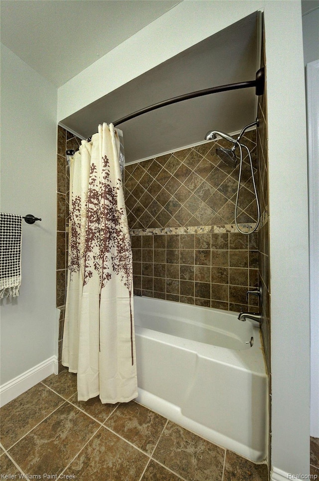 1320 W Drahner Rd, Oxford, MI 48371 - full bathroom featuring tile patterned floors and shower / bath combo