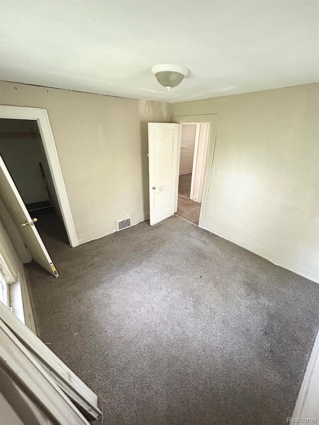 523 Grace St, Flint, MI 48503 - view of carpeted spare room