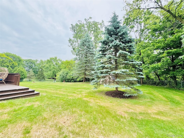 694 Robar Cir, Commerce Twp, MI 48386 - view of yard featuring a deck