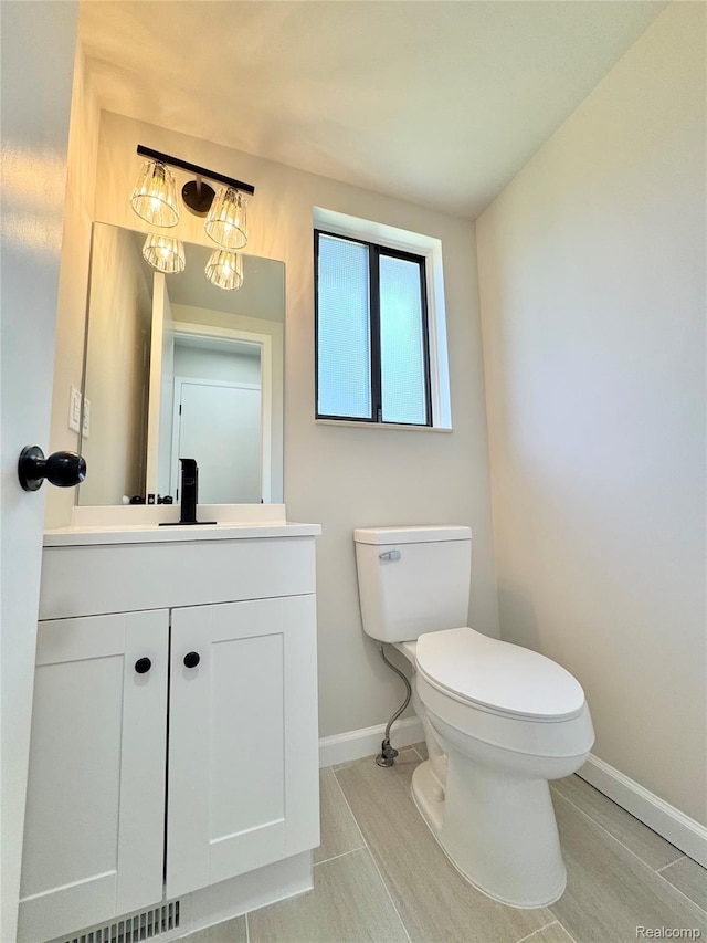 694 Robar Cir, Commerce Twp, MI 48386 - bathroom featuring vanity and tile patterned flooring