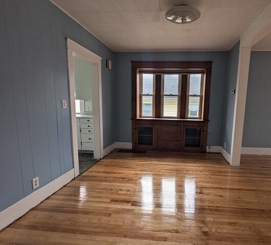 1212 Climax St, Lansing, MI 48912 - empty room with wood finished floors and baseboards