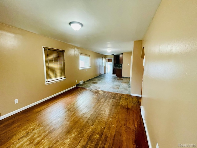 20817 Atlantic Ave, Warren, MI 48091 - unfurnished room with wood finished floors and baseboards