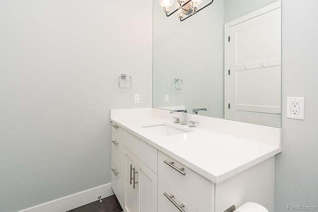 1021 S Washington Ave Unit G, Royal Oak, MI 48067 - bathroom with vanity and a chandelier