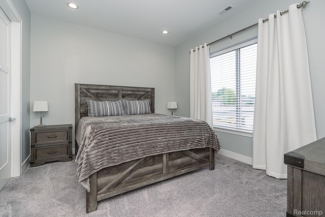 1021 S Washington Ave Unit G, Royal Oak, MI 48067 - carpeted bedroom with multiple windows and recessed lighting