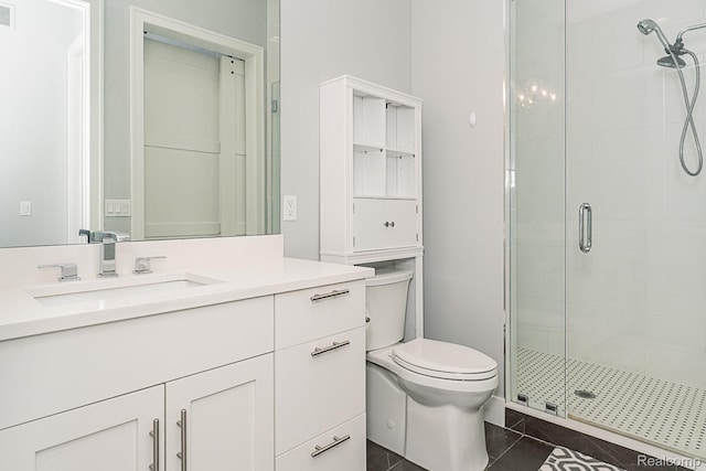 1021 S Washington Ave Unit G, Royal Oak, MI 48067 - full bathroom featuring a shower stall, vanity, and tile patterned floors