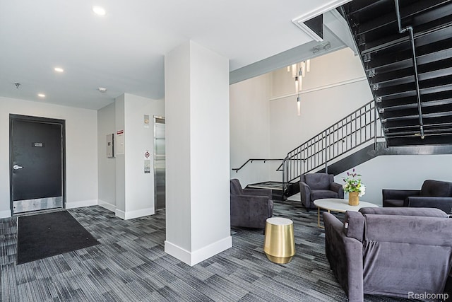 1021 S Washington Ave Unit G, Royal Oak, MI 48067 - entryway featuring stairs, recessed lighting, and dark carpet