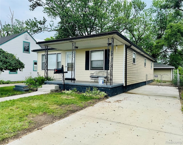 14276 Hobart Ave, Warren, MI 48089 - view of front of property with a porch and concrete driveway