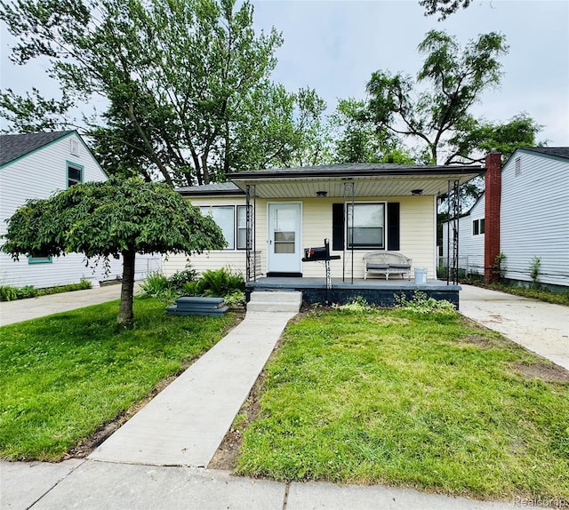 14276 Hobart Ave, Warren, MI 48089 - bungalow featuring covered porch and a front yard